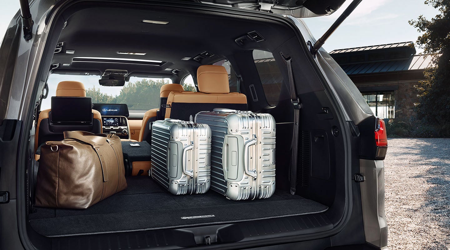 Detail shot of the open trunk of the 2022 Lexus LX 600 with luggage. | Moses Lexus in Saint Albans WV